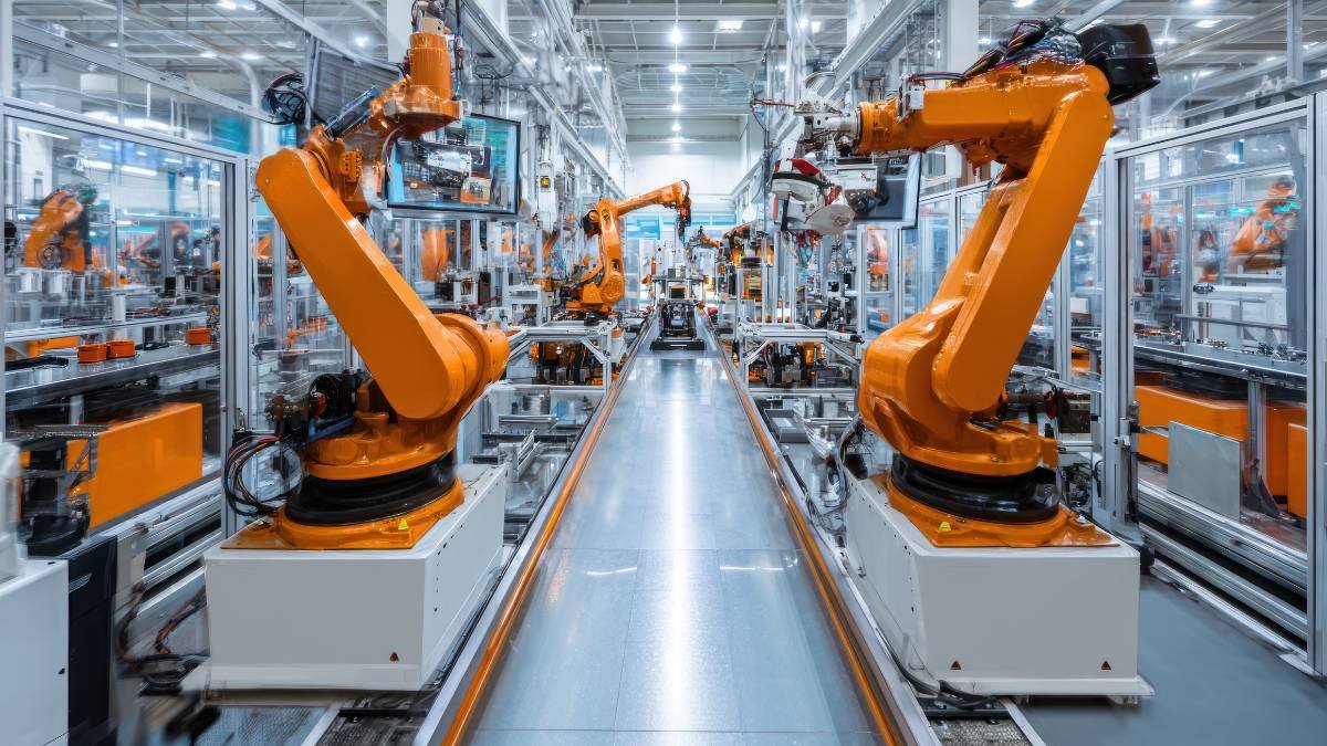 Industrielle Roboterarme in einer automatisierten Fertigungsanlage.